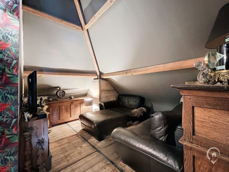 Condrogest - Commerce avec logement à vendre à Ciney, sur l'axe principal