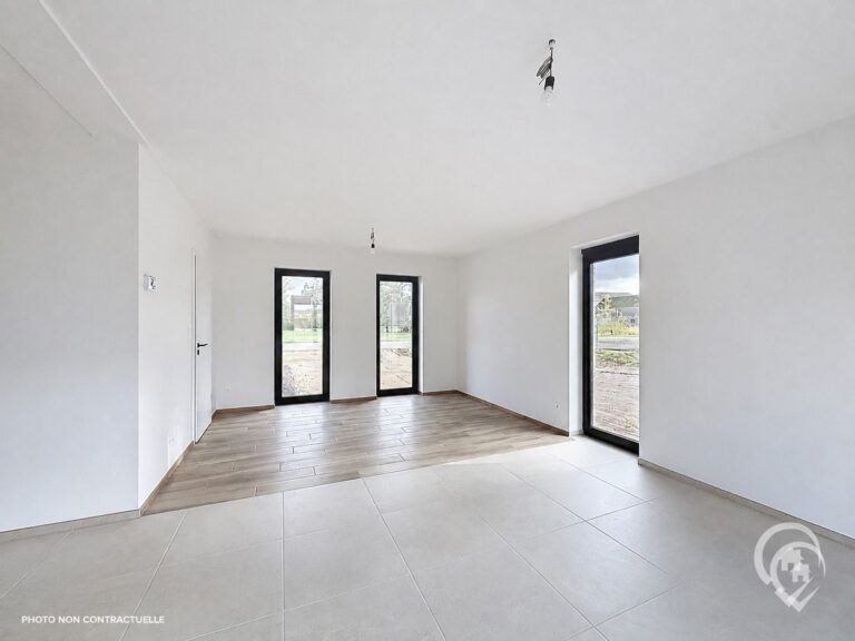 Condrogest - Maison neuve 4 façades à Humain – clé sur porte